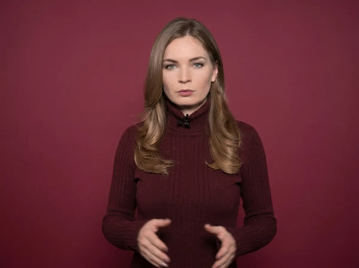 AI-фотосессия «Broadcast News Presenter in Maroon Studio»