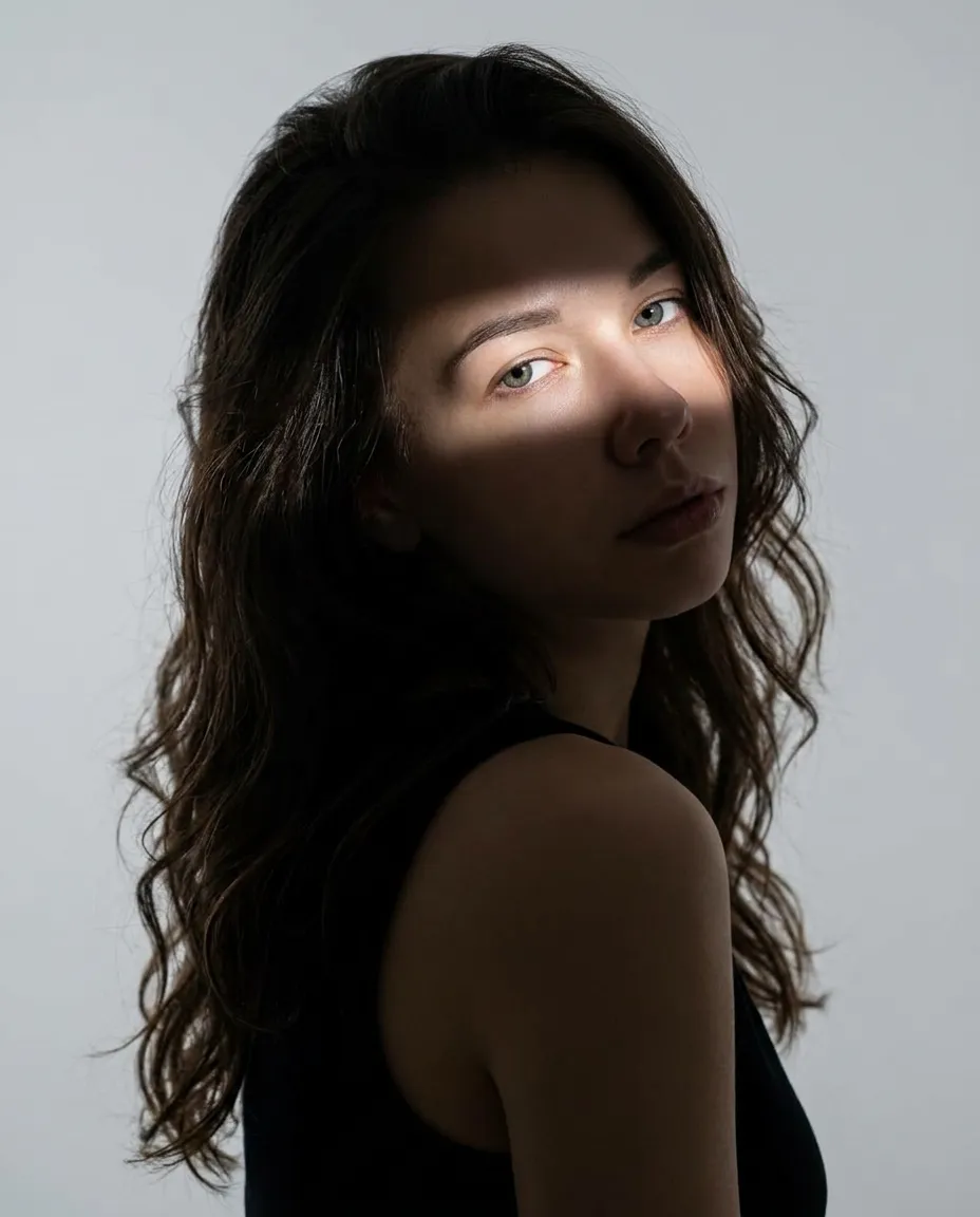 AI-фотосессия «Chiaroscuro Studio Portrait with Dramatic Shadow Pattern»