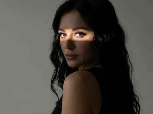 AI-фотосессия «Chiaroscuro Studio Portrait with Dramatic Shadow Pattern»